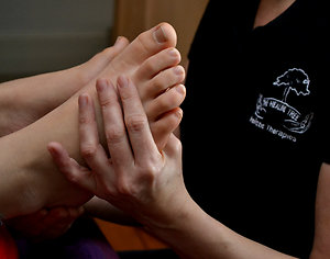Reflexology / RLD / VRT / Maternity Reflexology. Feet with logo